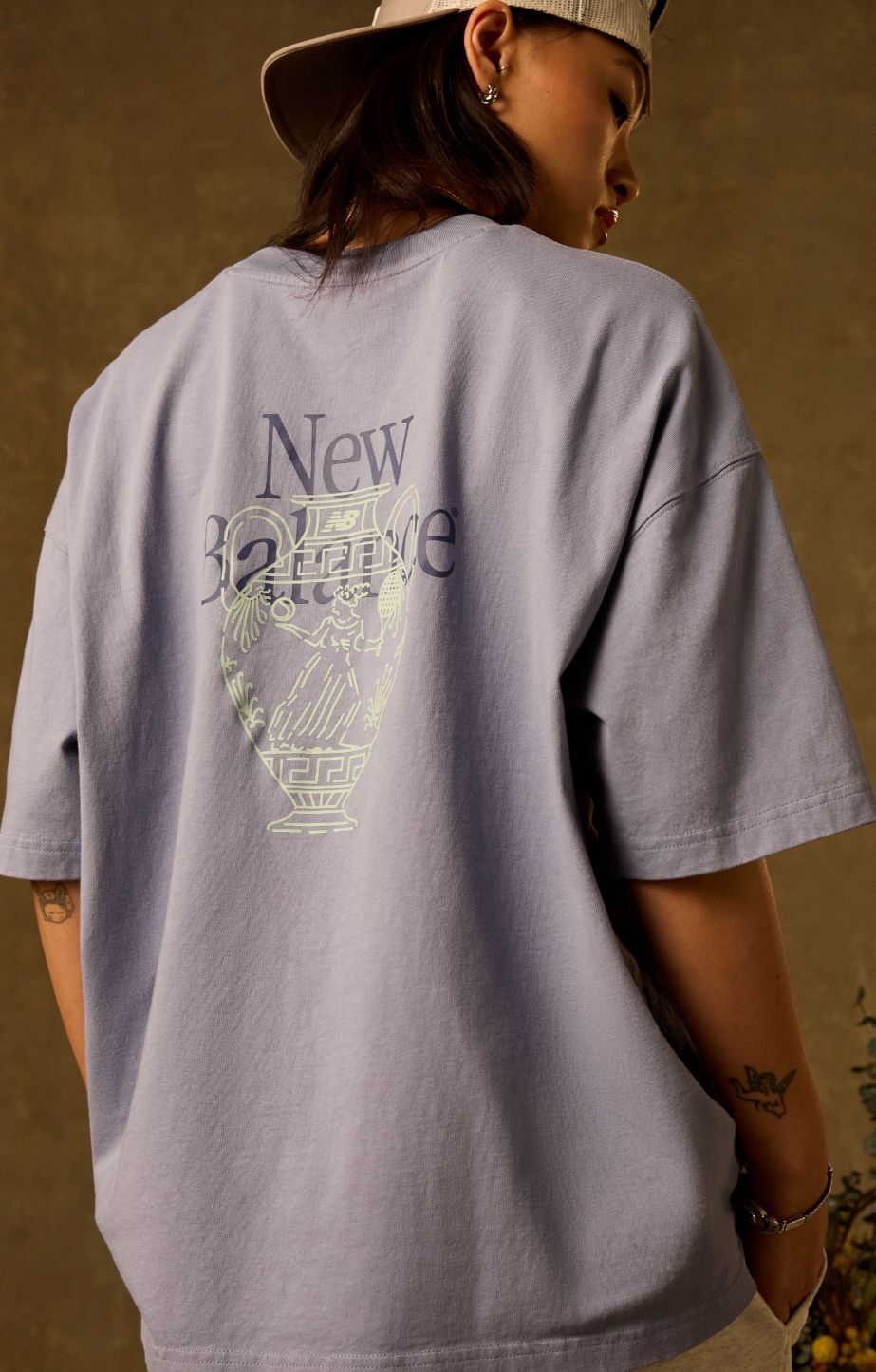 Close up of a person wearing new balance apparel