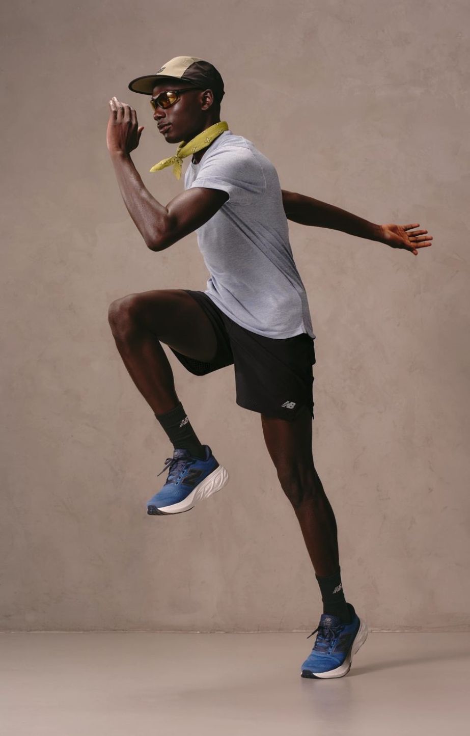 Man running on the spot wearing new balance fresh foam x 880v15 running shoes