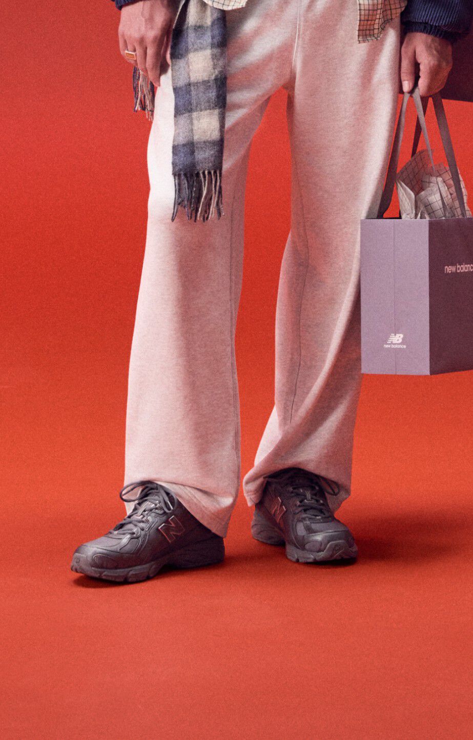 Close up of a person wearing new balance 740s