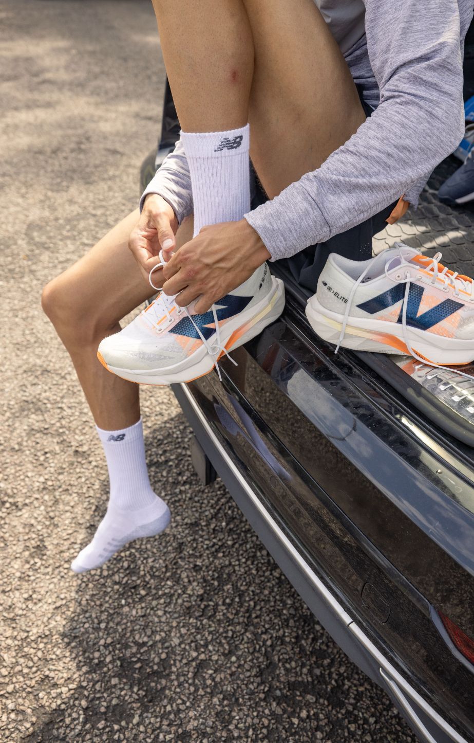 Close up of a person wearing new balance fuelcell