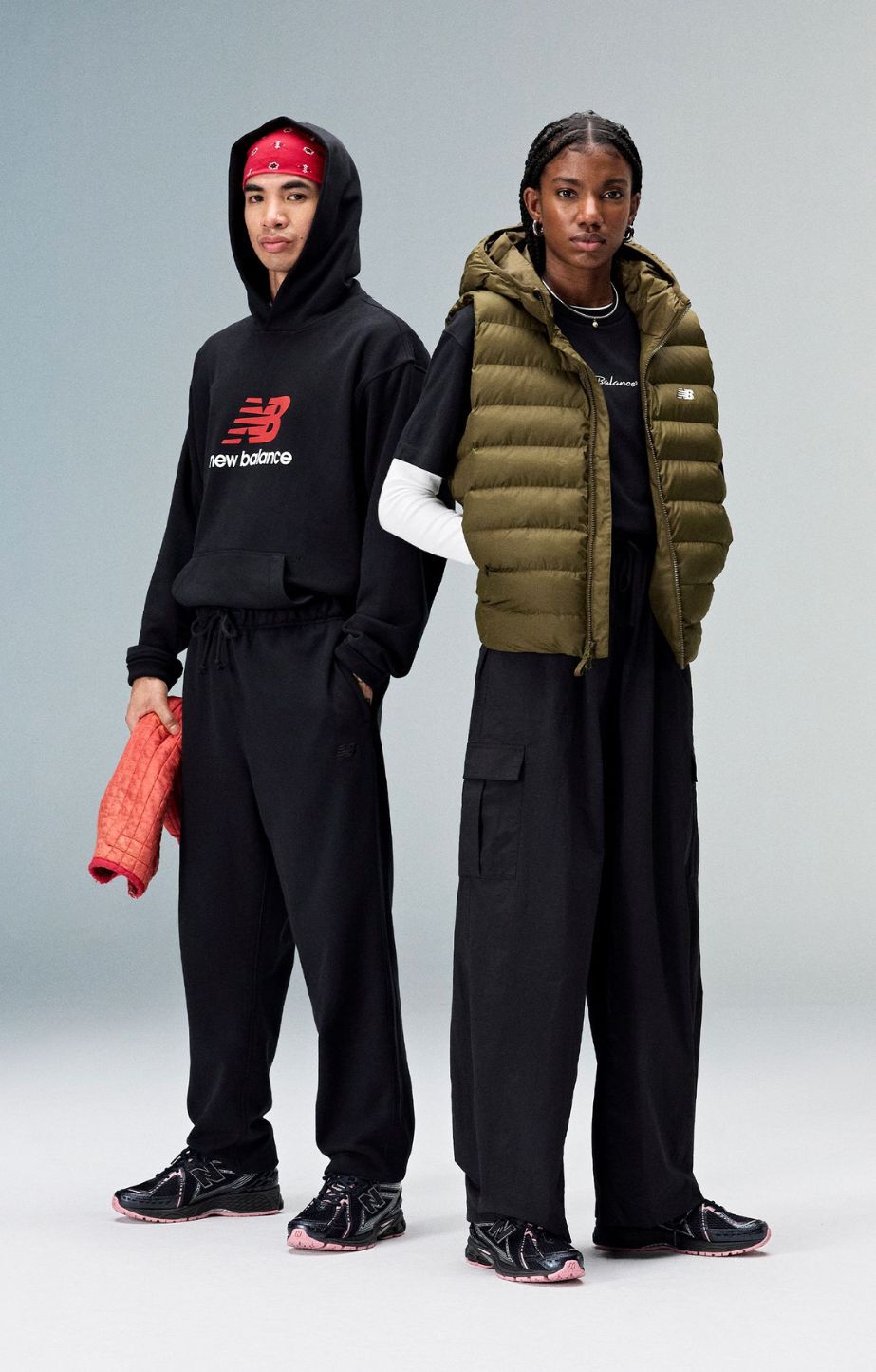 Woman and man wearing new balance 1906 sneakers