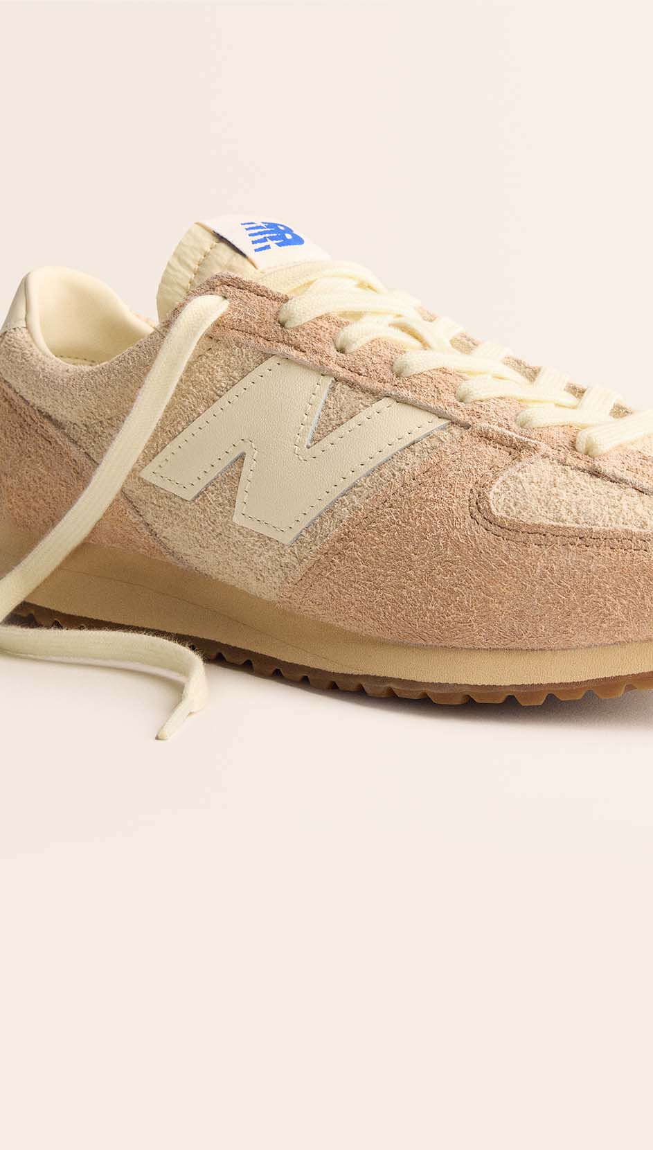 A close-up image of a tan 471 sneaker.