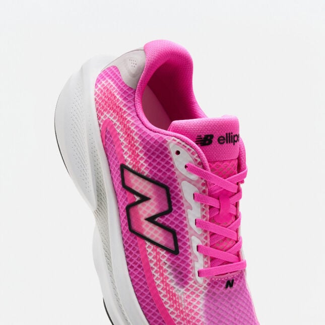 Pair of pink running shoes on a white background 