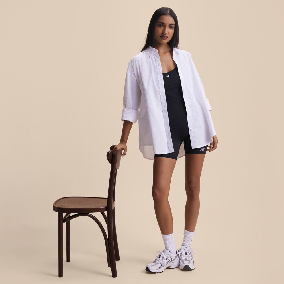 Woman in studio background wearing 530 shoes