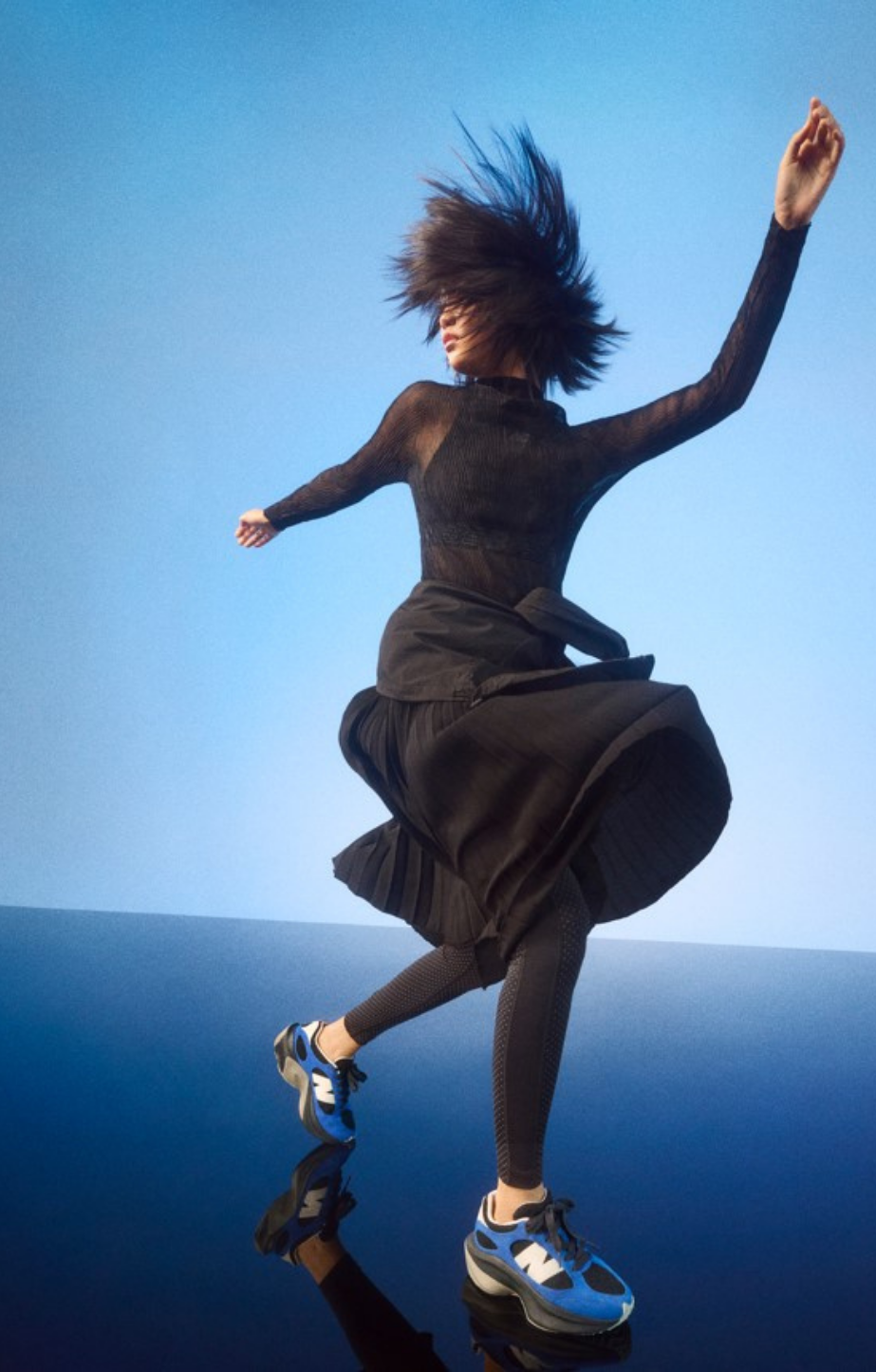 woman dancing in new balance wrpd runners