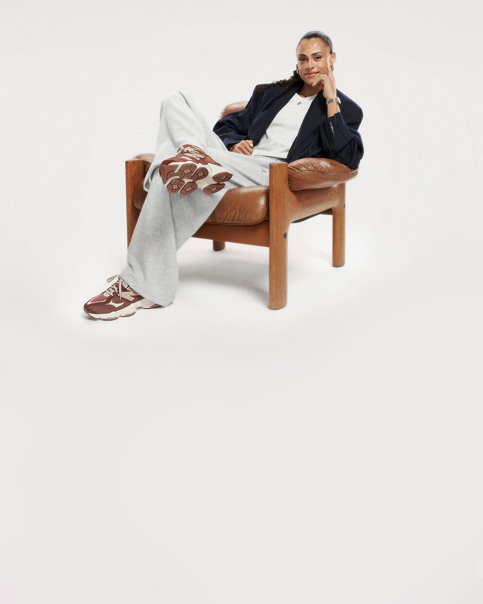 Sydney Mclaughlin sitting on a chair 