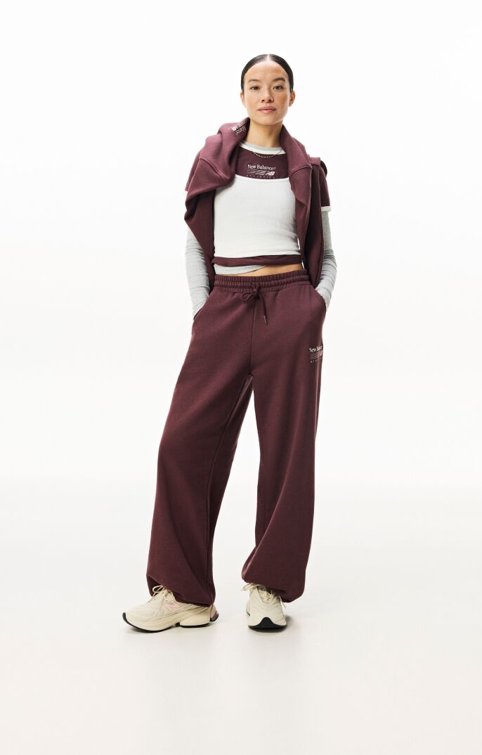 Woman standing in studio wearing new balance