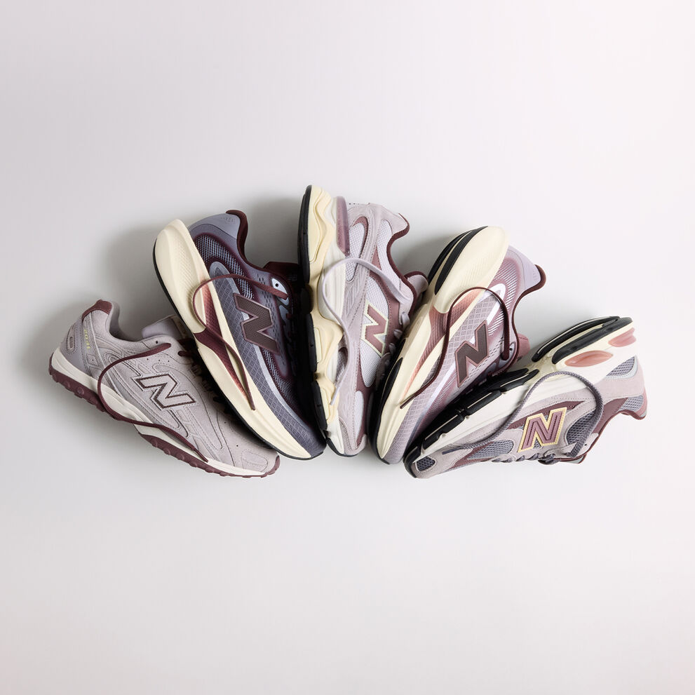 The Crimson Fog Pack laying fanned out on a grey background