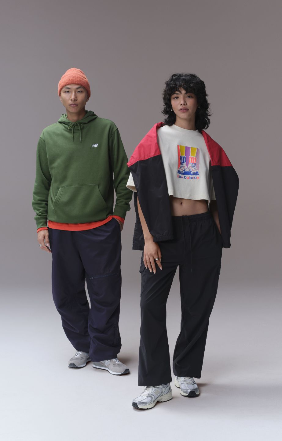 Two people wearing new balance 530 sneakers