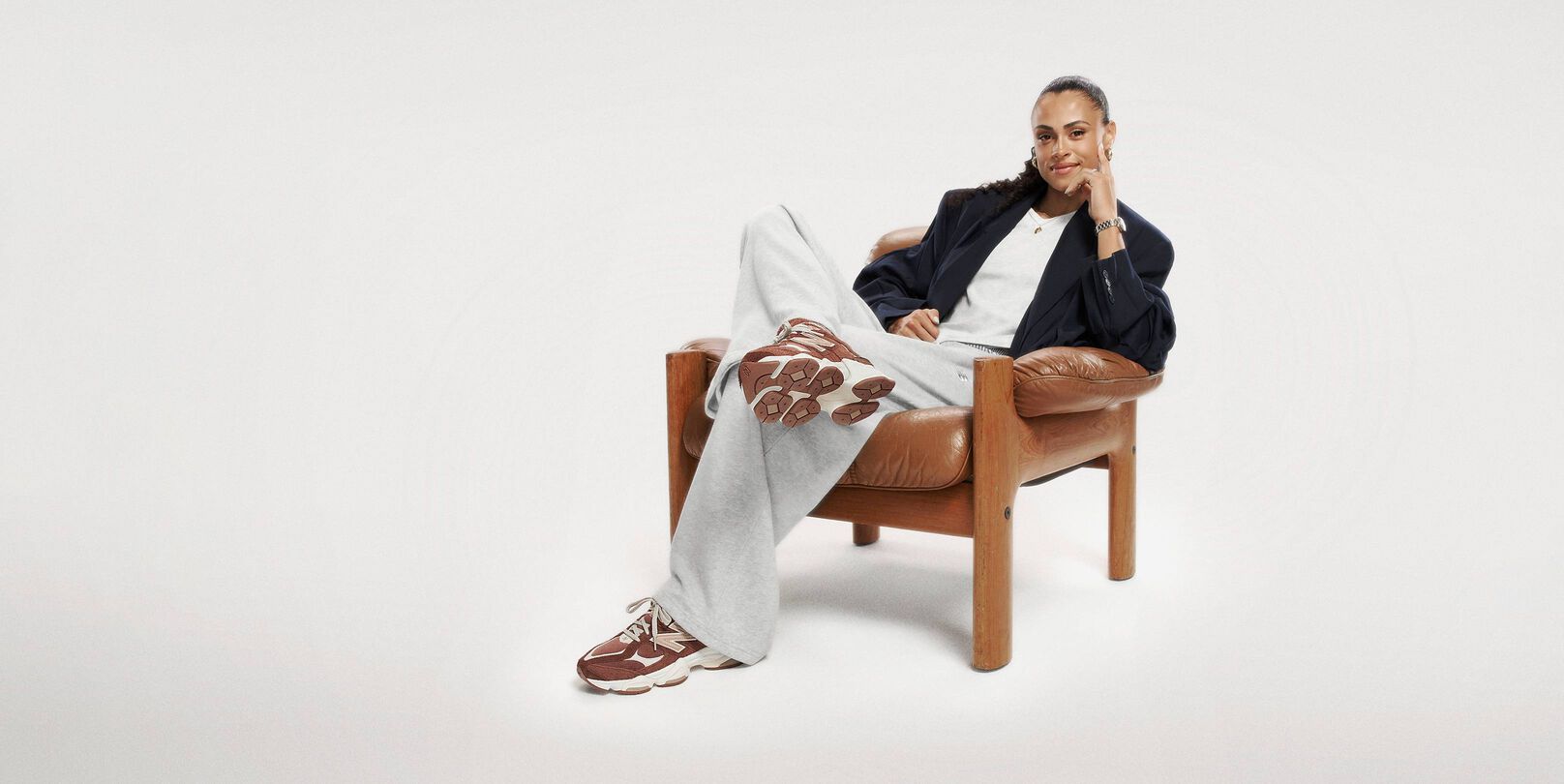 Sydney Mclaughlin sitting on a chair 